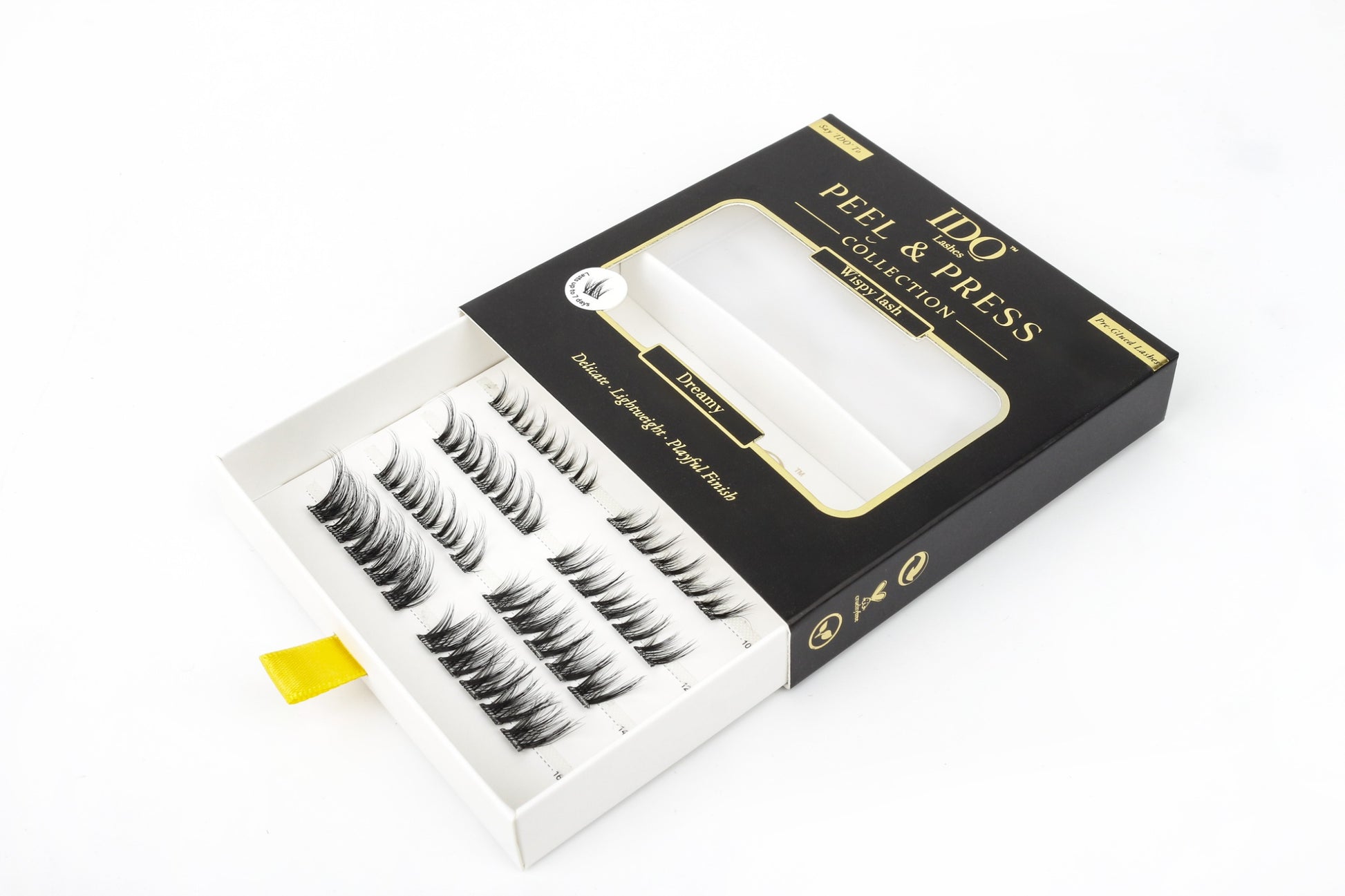 Box of false eyelashes with a clear window on a white background