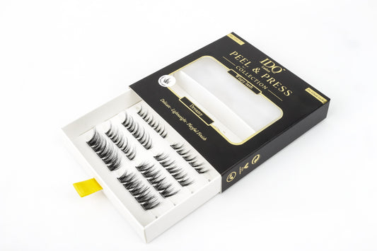Box of false eyelashes with a clear window on a white background