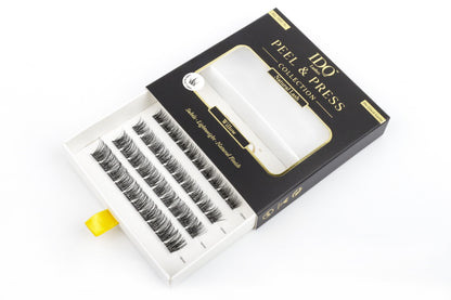 Box of false eyelashes with a white background