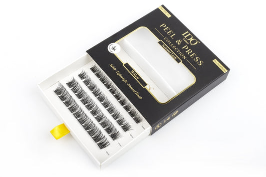 Box of false eyelashes with a white background